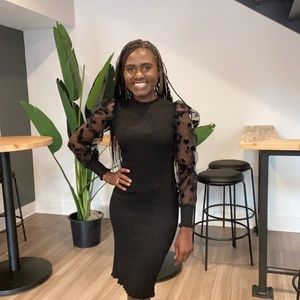 Black sweater dress with sheer sleeves